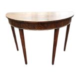 A D-shaped nineteenth century mahogany hall table, the plain frieze with moulded trim raised on