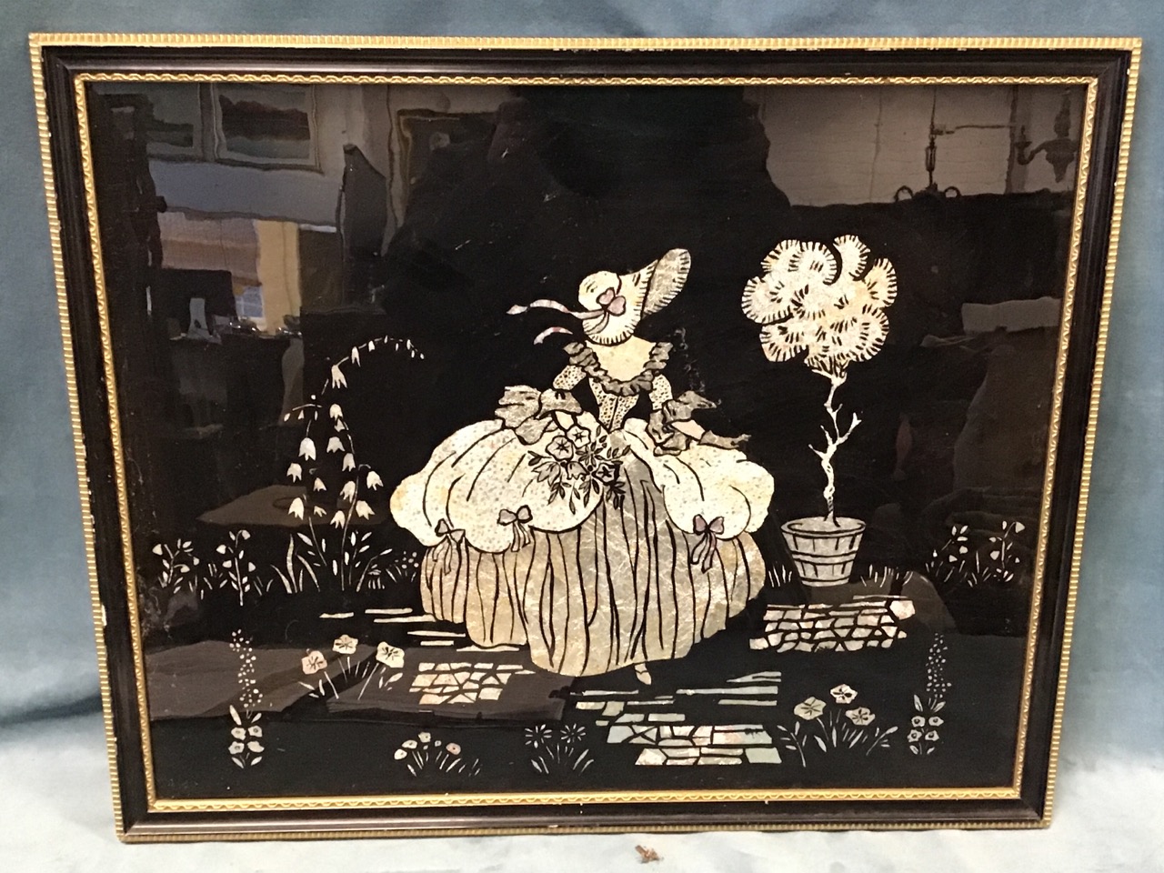 A 50s pressed silver foil silhouette picture depicting bonneted crinoline lady in garden on black - Image 2 of 3