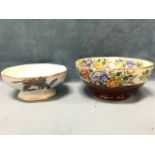 A Maling peony rose bowl decorated with ruby fishscale bands and floral frieze framed by twisted