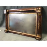 A nineteenth century rosewood overmantle mirror, the split turned columns on frame with gilded