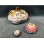 A Chelsea style melon shaped box & cover with gilt leaf & branch handle, decorated with flowers &