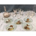 A set of five circular handpainted glass placemats - pheasant, duck, partridge, woodcock & grouse; a
