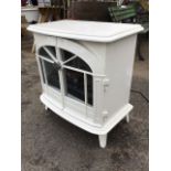 A boxed Dimplex Chevalier log effect electric stove with white enamelled finish, having arched