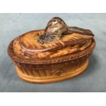 A French porcelain woodcock dish & cover, the ribbed tureen with ropetwist border having lid