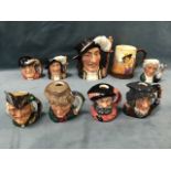 A collection of Royal Doulton character jugs - Athos big & small, Robin Hood, Gone Away, Falstaff,