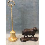 A lead & cast iron weighted Victorian brass doorstop with twisted shaft and scrolled serpent handle,