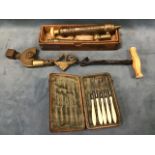 A Georgian leather cased set of fine bone handled dentists tools; a Victorian boxed W & H Hutchinson