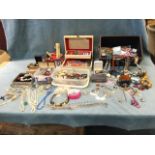 A quantity of costume jewellery - bracelets, brooches, bangles, beads, earrings, watches, rings,