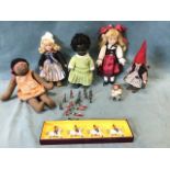 Five dolls dressed in national costume, one in a knitted outfit; a Britains mint and boxed set of