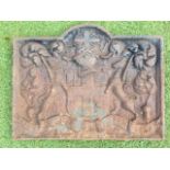 A rectangular antique cast iron fireback, the arched central panel with City of London coat of