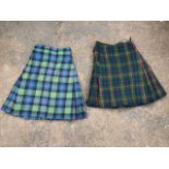 Two C20th Scottish tartan kilts, one with leather buckles & straps. (2)