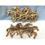A pair of heavy cast iron wall plaques depicting galloping horses. (26.75in) (2)