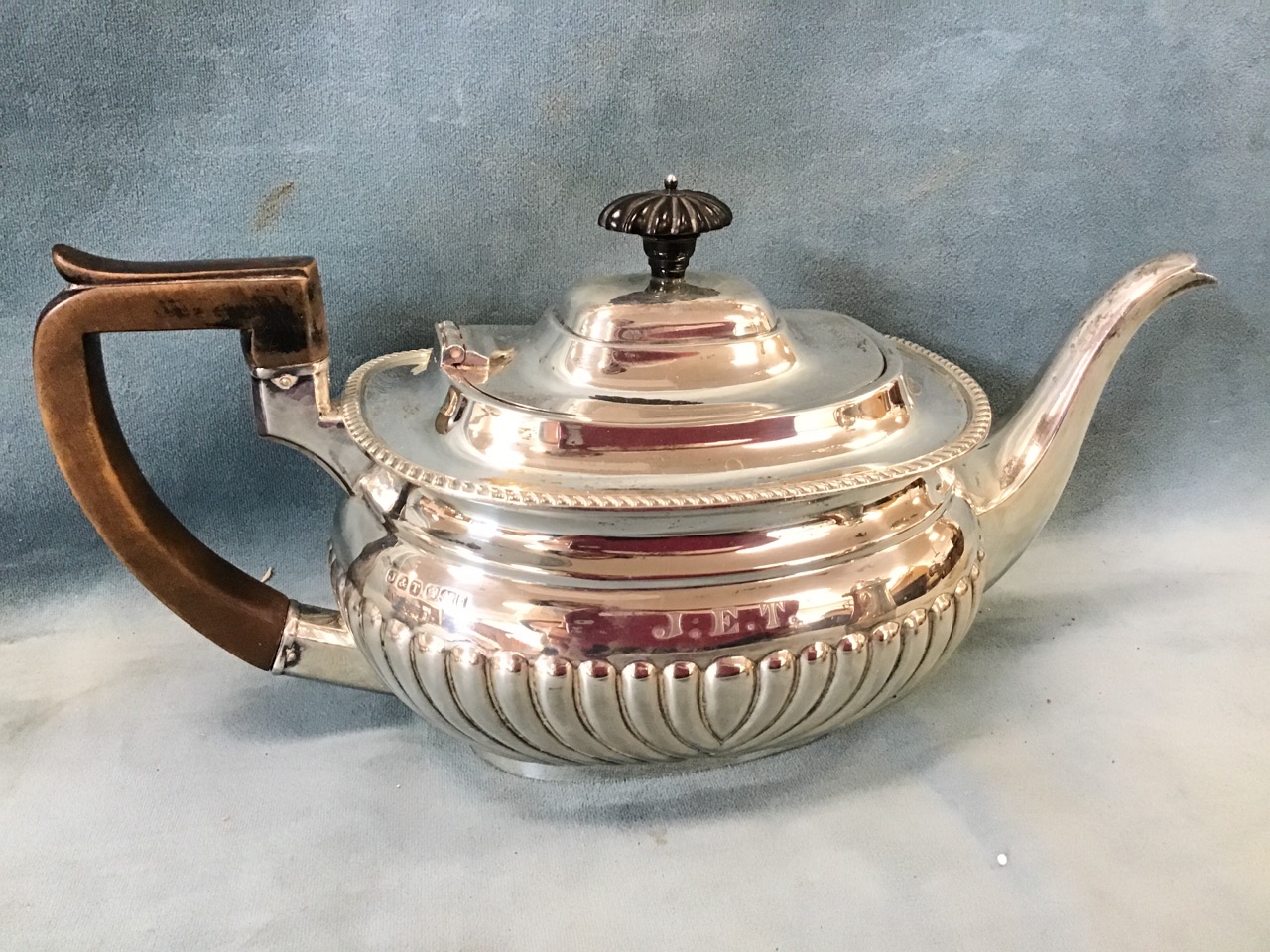 A Victorian three-piece hallmarked silver teaset with oval bulbous gadrooned bodies and angled - Image 3 of 3