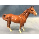 A large Beswick horse in chestnut glaze - printed Beswick mark and painted number 95. (10.25in x 8.