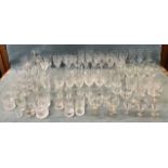 A large quantity of drinking glasses - sets of rummers, wine glasses, several sets, brandy balloons,