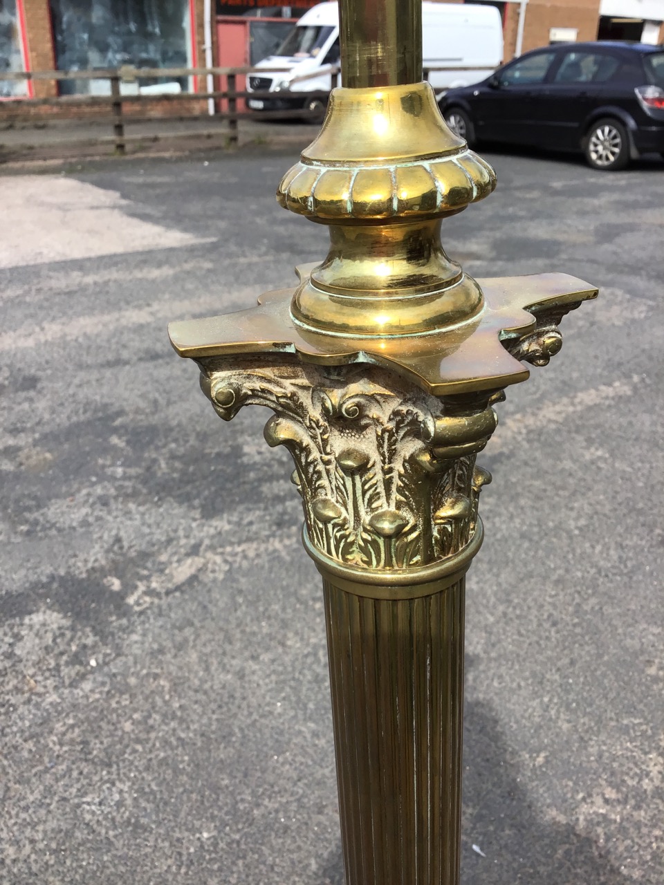 A late Victorian telescopic brass standard lamp, the fluted column with scrolled capitals above a - Image 2 of 3