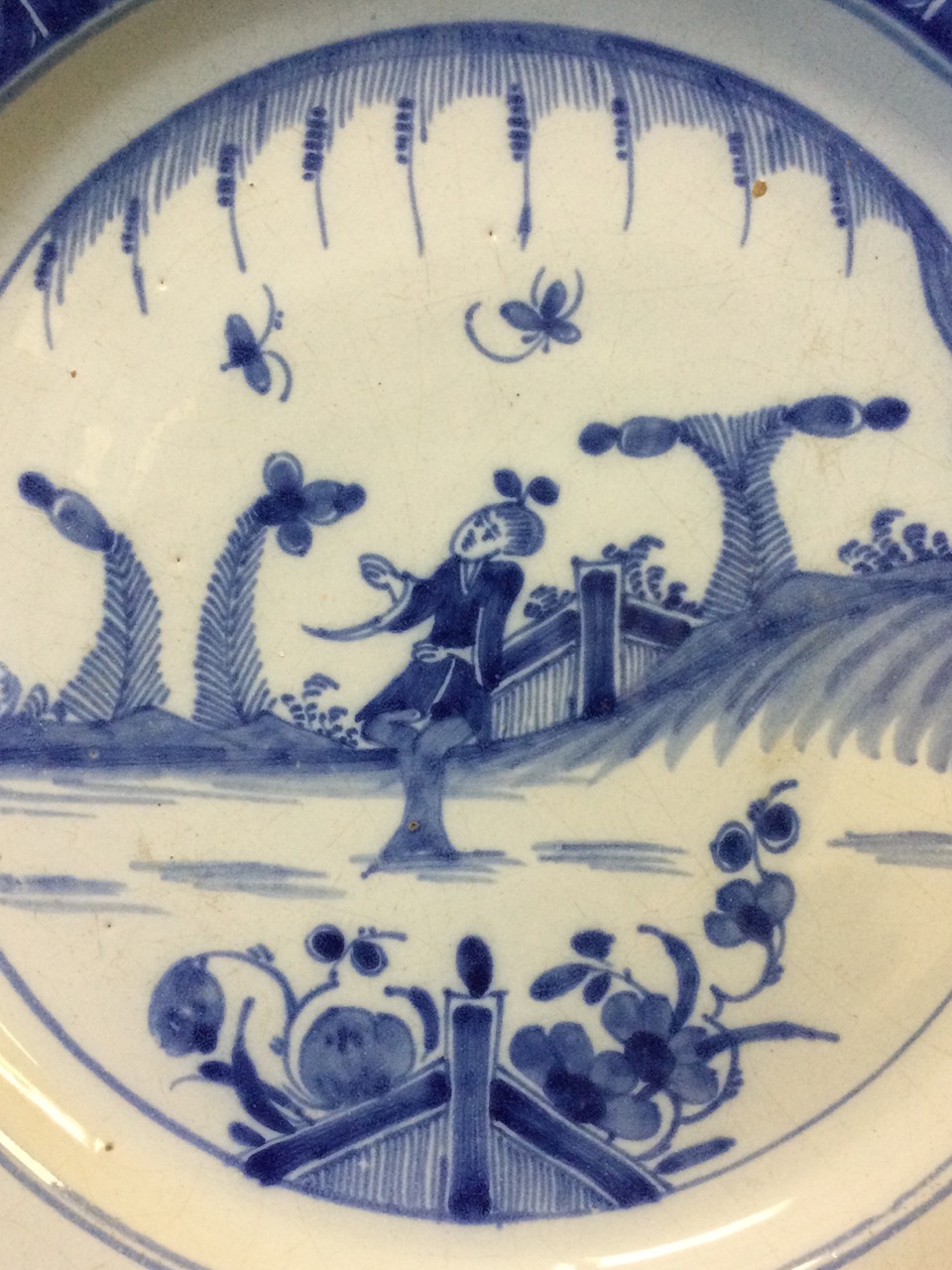 A C18th English delft tin-glazed charger with hand-painted blue & white chinoiserie decoration of - Image 2 of 3