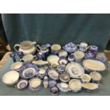 A large quantity of blue & white mostly C19th transfer printed ceramics - jugs, teapots,