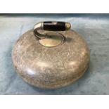 A circular Victorian granite curling stone, the detachable ebonised handle with silver plated