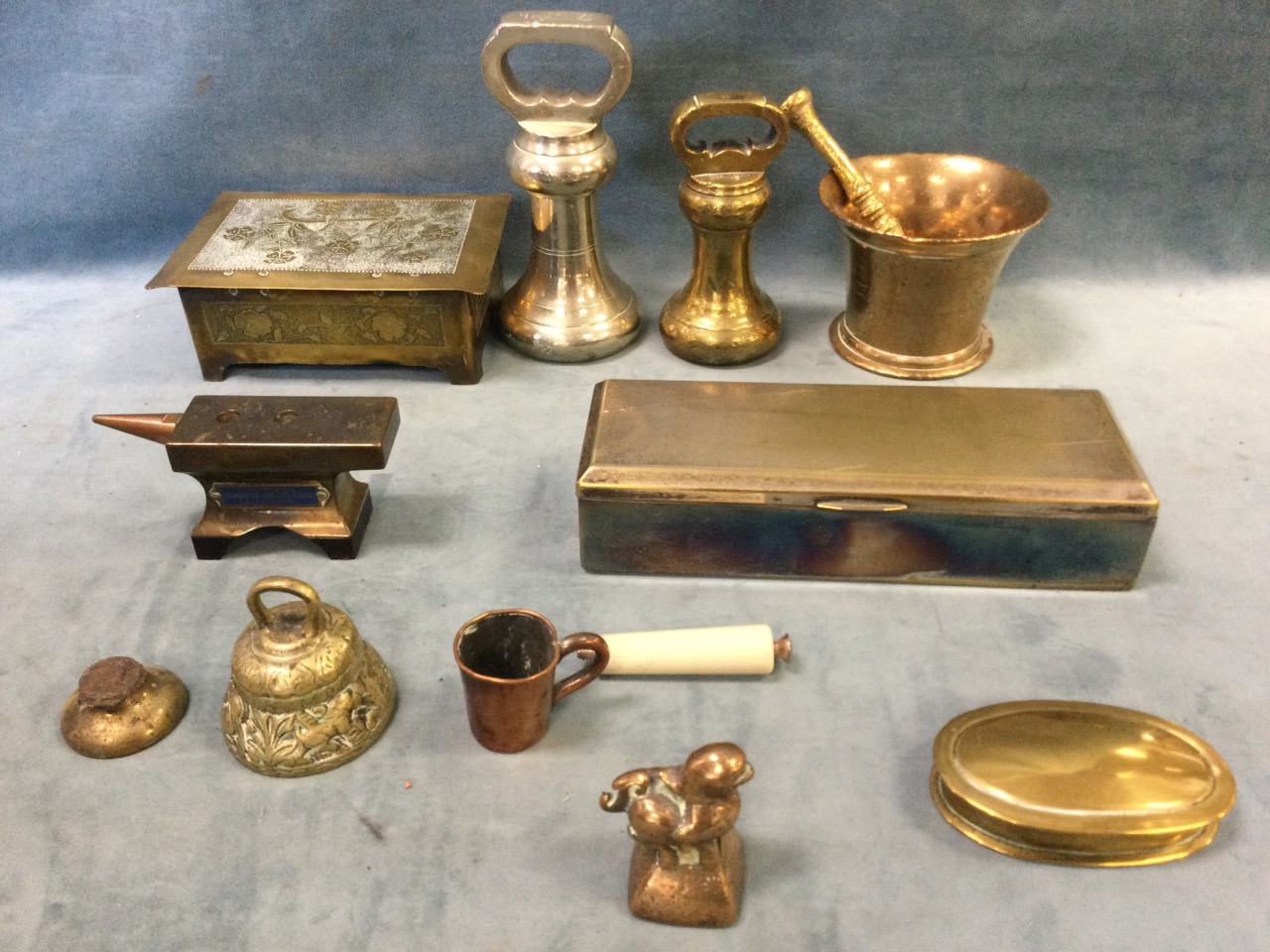 Miscellaneous brass - cigarette boxes, candle snuffers and trays, an anvil, pestle and mortar, - Image 3 of 3
