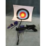 A hand-held crossbow with 26 arrows, and a set of card practice targets. (A lot)