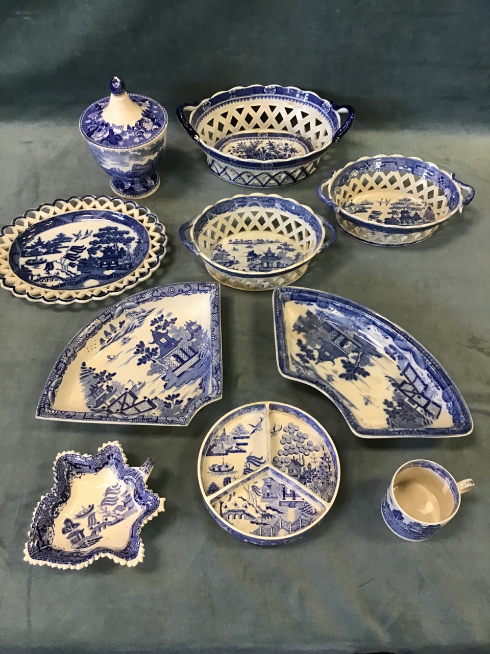 A group of late 18th/early 19th century blue and white pearlware including a pair of pierced