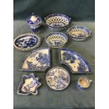 A group of late 18th/early 19th century blue and white pearlware including a pair of pierced