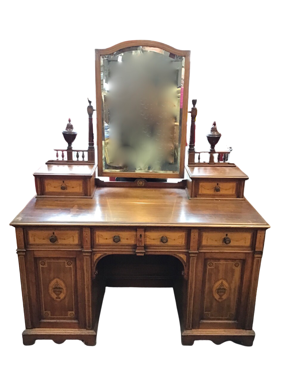 A late Victorian mahogany dressing table inlaid with satinwood panels with urns and ribbon swagged