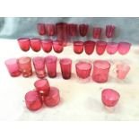 A collection of Victorian cranberry drinking glasses including wines, sherries, tumblers, punch