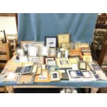 A quantity of contemporary photo frames - glass, wood, silver plated, some boxed, mirrored, gilt,