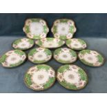 A Victorian Coalport eight place dessert service decorated with polychrome floral sprigs in gilt