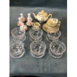 A hand enamelled Ridgways floral part teaset; a set of six Edinburgh crystal sundae dishes on saucer