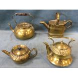 A brass lidded watering can with ribbed sides; a Henry Loveridge & Co brass teapot with infuser,