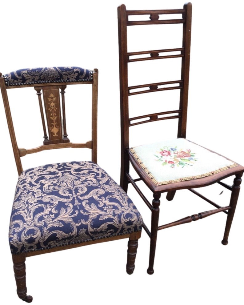 An Edwardian rosewood nursing chair with stud upholstered back rail above foliate marquetry inlaid