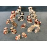 A collection of C19th Staffordshire ceramic wally dogs, with hand-painted brick red, black, brown