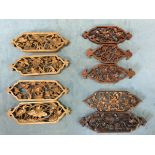 A set of four Chinese rectangular carved hardwood pierced panels with birds and foliage in shaped