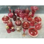 A quantity of Victorian cranberry glass - vases, decanters and stoppers, pots, cruets, silver