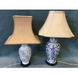 A Chinese style tablelamp with blanc-de-chine pierced blossom foliage vase on hardwood base,