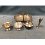 Five pieces of mid-twentieth century electro plate - bowls, a jug, a basket and vase. (5)
