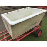 A stoneware butlers sink, the angled front with moulded rim. (27.5in x 20.5in x 15in)