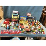 A large quantity of die-cast model cars, lorries, tractors, etc., Corgi, Matchbox, Dinky, some