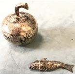 Judaica - an antique unmarked European silver articulated fish shaped spice box, and a lidded