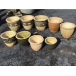 Nine miscellaneous glazed stoneware garden pots - pairs, sgraffito decorated, graduated pairs,