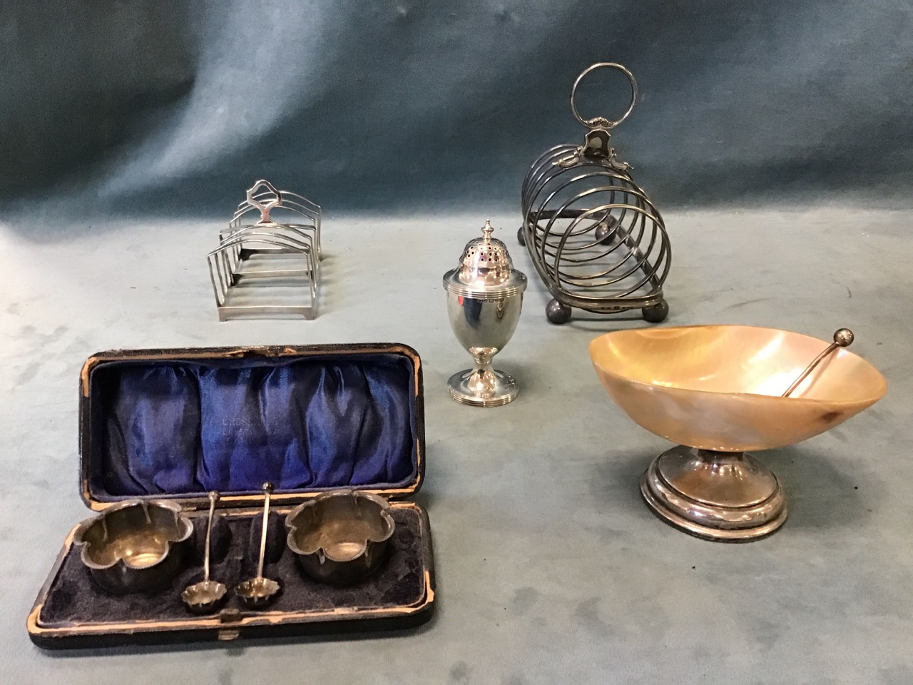 A collection of silver - a pair of lidded capstan inkwells - Birmingham 1919, a shell salt with - Image 2 of 3