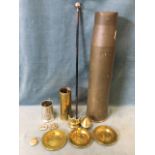 A collection of militaria - a 4.5 caliber shell casing; a shell casing engraved for Captain KM
