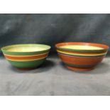 A pair of Clarice Cliff striped glazed bowls made for Liberty’s in the Bizarre pattern by
