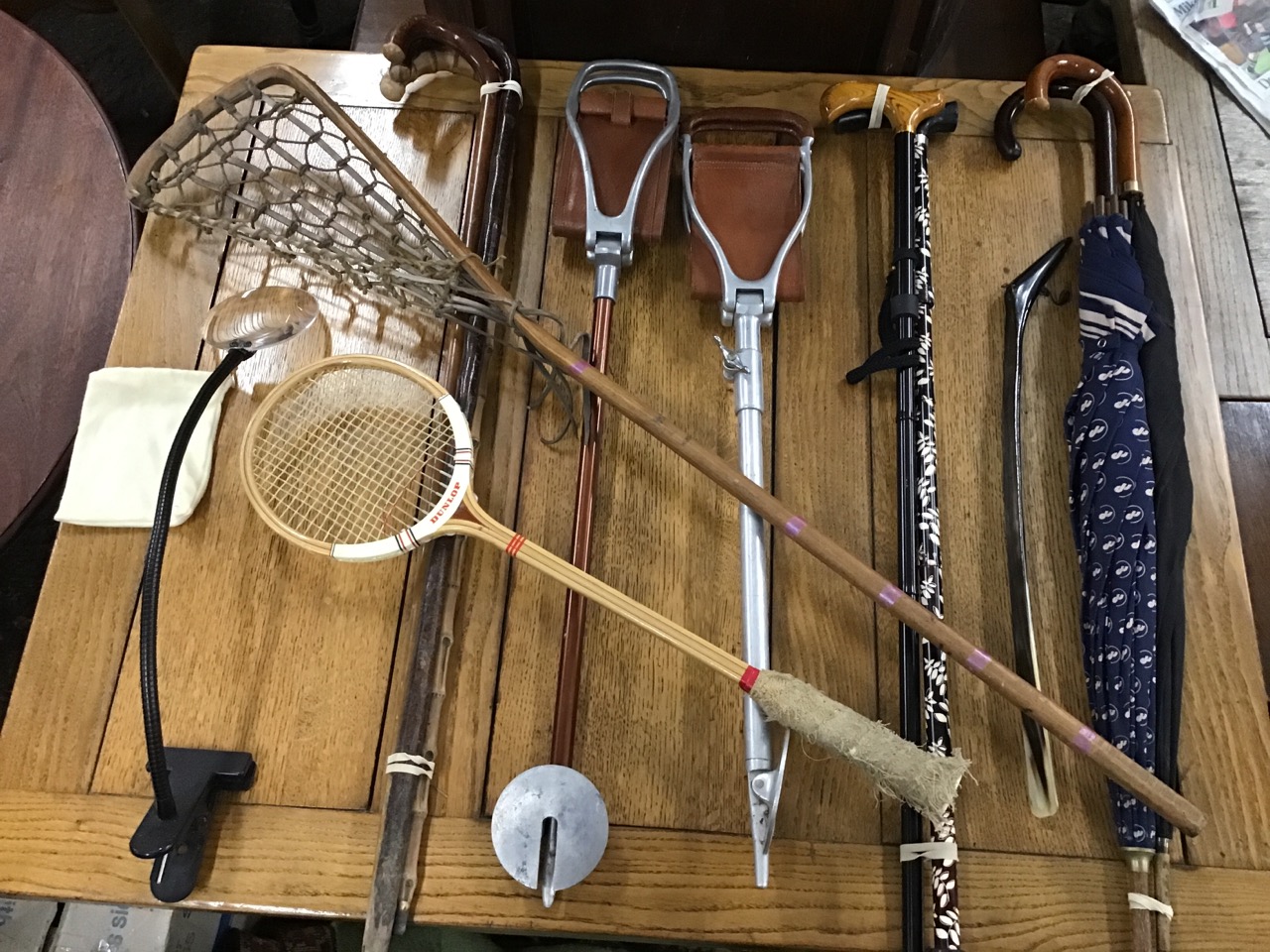 Miscellaneous walking sticks - two leather seated shooting sticks - one Swaine-Brigg, an Austin Reed