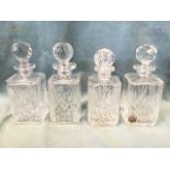 Four heavy square cut glass decanters with ball stoppers - star cut bases, Edinburgh, canted
