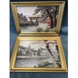 A pair of Japanese silkwork landscape pictures, finely sewn with river scenes in gilt frames -