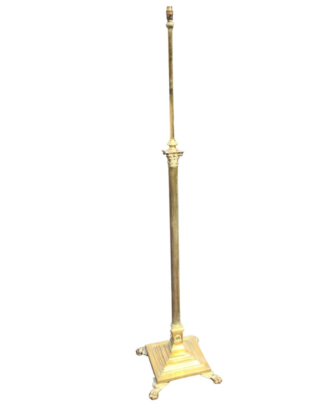 A late Victorian telescopic brass standard lamp, the fluted column with scrolled capitals above a
